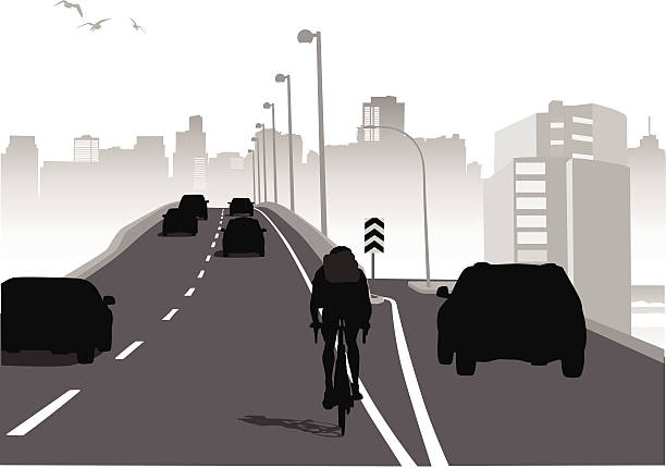 AlmostThere A cyclist heads into the city on a busy roadway. traffic silhouettes stock illustrations