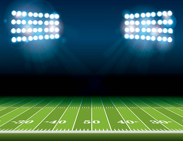 American Football Field with Stadium Lights An illustration of an American Football field with bright stadium lights shining on it. Vector EPS 10 available. Room for copy. football field stock illustrations