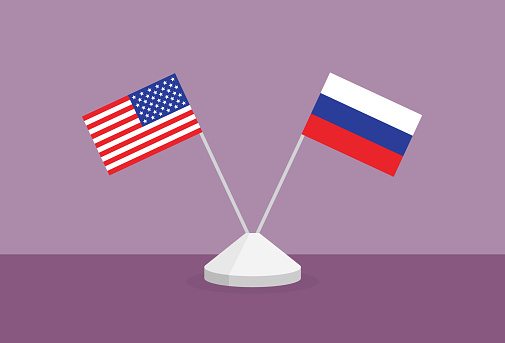 US and Russia flag on a table