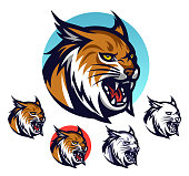 Angry lynx or bobcat head vector emblem with four variations.