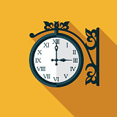 A flat design clock icon with a long shadow. File is built in the CMYK color space for optimal printing. Color swatches are global so it’s easy to change colors across the document.