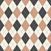 istock Argyle pattern seamless in grey and  beige. Geometric stitched diamond vector graphic background for gift wrapping paper, socks, sweater, jumper, other modern spring autumn textile or paper design. 1306886004
