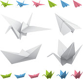 istock Arrangement of drawings of origami cranes, planes, and boats 165902143