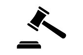 istock Auction silhouette hammer. Judge gavel black icon. 1285932547
