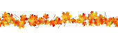 Horizontal seamless pattern bright dried maple autumn foliage isolated on white. Graphic design autumn symbol. Red orange yellow autumn leaves with shadow. Autumn foliage seasonal background. Vector