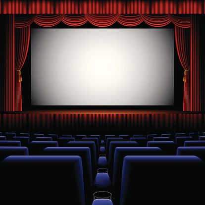 A back row view of a cinema screen