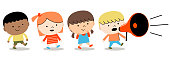 istock Back to school: group of children boys and girls walking with megaphone 1002595844