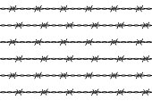 istock Barbed wire background 1343453150