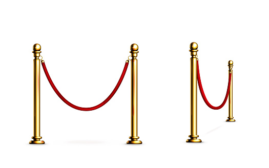 Barrier with rope and gold poles for red carpet