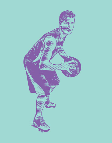 Basketball player passing ball