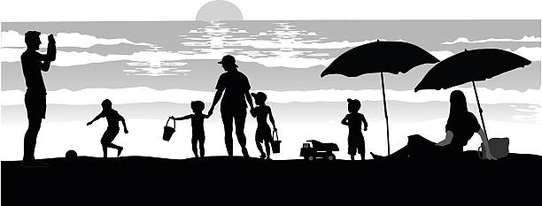 Beach Silhouettes At Dusk A vector silhouette illustration of people enjoying the beach at sunset.  There is a mother with her young children walking towards the water, a young boy playing ball, another young boy with a toy truck, and a young woman posing under an umbrella while her boyfriend takes her photograph. beach silhouettes stock illustrations