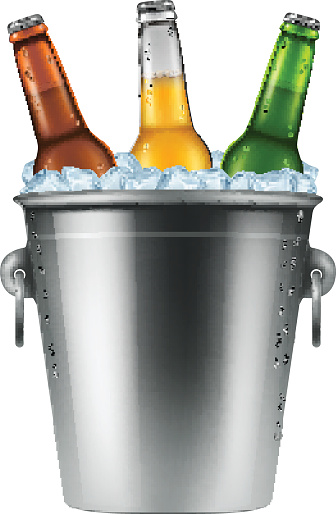 Beer bottles in an ice bucket.