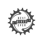 Best Bikes Ever Emblem. Design Element for Bike Shop or Advertising Banner. Chainring and Ribbon, Monochrome Vector Illustration.
