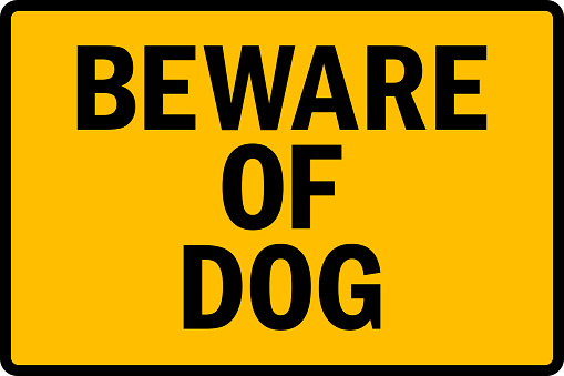 Beware of dog warning sign.