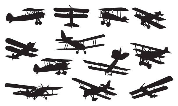 ilustraciones, imágenes clip art, dibujos animados e iconos de stock de biplane silhouettes - private plane