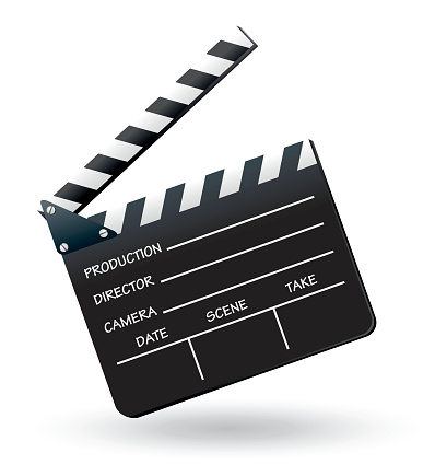 A black and white clapboard on plain background