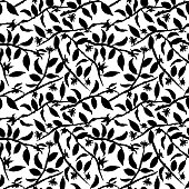 Black and white silhouettes of cacao tree flowers on branches. Seamless vector pattern. Great for fabric, packaging, backgrounds, stationery, home decor, wallpaper and more.