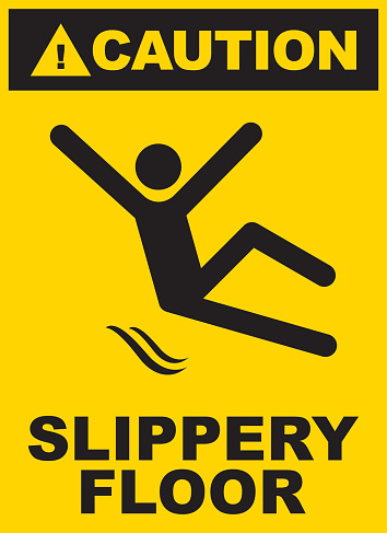 Black and yellow slippery floor sign