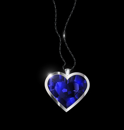 black background and jewel pendant blue heart with golden chain