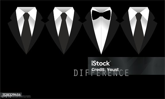 istock Black Business Suit with a Tie and Bow Tie Difference Concept 1128329454