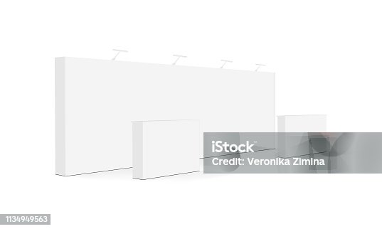istock Blank trade show booth or event display stand with tables isolated 1134949563