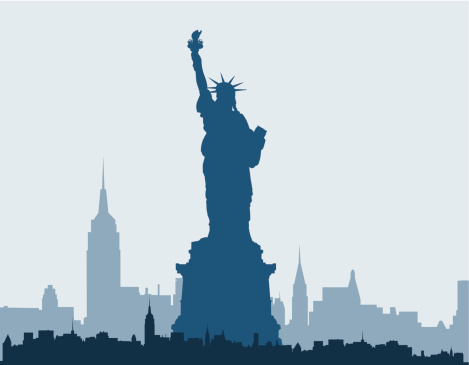 Blue silhouette of Statue of Liberty and New York skyline