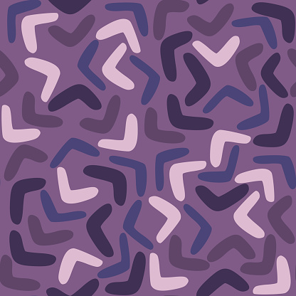 Boomerang seamless pattern on purole background. Abstract shape endless wallpaper.