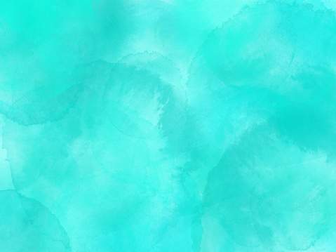Border of hues of turquoise blue paint splashing droplets. Watercolor strokes design element. Turquoise blue colored hand painted abstract texture.