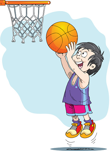 A boy plays basketball