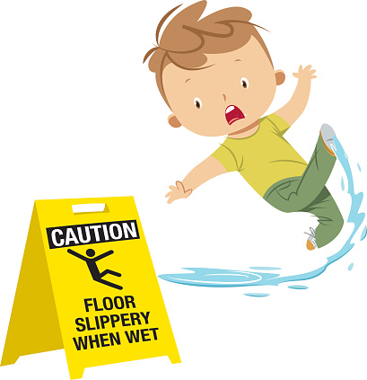 Boy slipping on wet floor