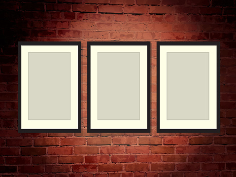 Brick wall art gallery background with frames