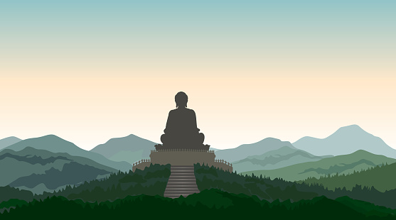Buddha  in meditation statue silhouette on the top of the hill. Asian mountain landscape. Rural skyline