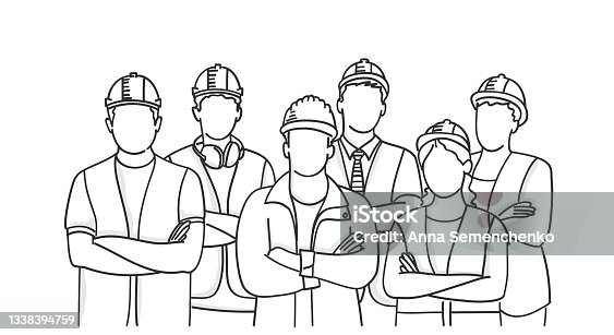 istock Builder group wearing helmets with arms crossed. 1338394759