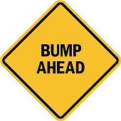 Bump ahead sign. Black on yellow diamond background. Traffic signs and symbols.