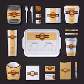 Fastfood restaurant corporate design with plastic and paper packaging and stationery on black background isolated vector illustration