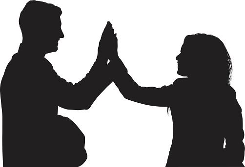 Business couple giving high fivehttp://www.twodozendesign.info/i/1.png vector