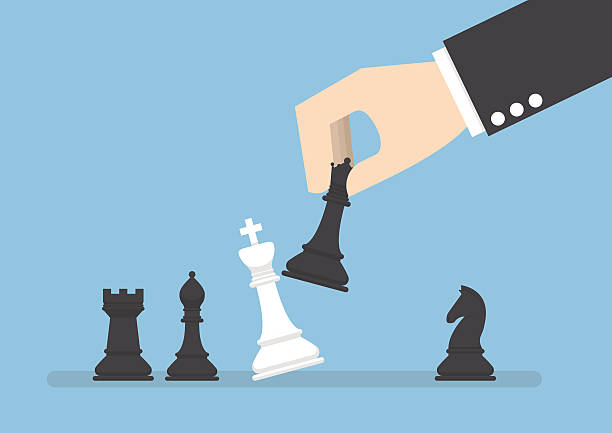 Businessman hand use black queen checkmate the white king Businessman hand use black queen checkmate the white king, business strategy, eliminate rival concept chess stock illustrations