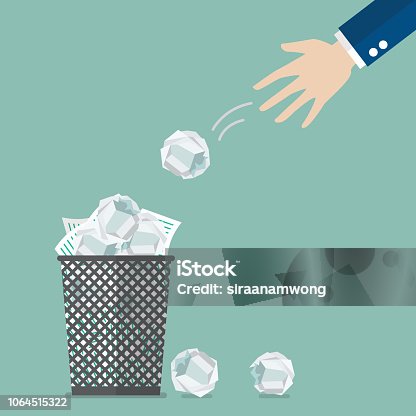 istock Businessman throwing crumpled paper to trash 1064515322