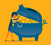 istock Businesswoman - Piggy Bank - Investment 1338057920