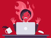 istock Businesswoman working with laptop flamed in anger 1340675919