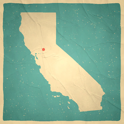 Map of California with a retro style, a vintage effect on an old textured paper.