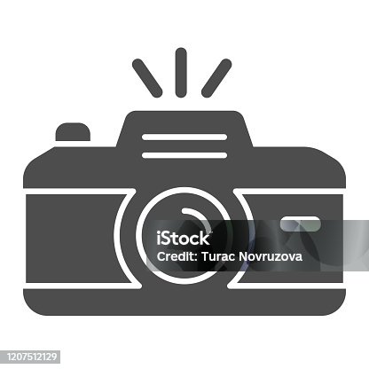 istock Camera solid icon. Professional photocamera with flash. Festive Event and Show vector design concept, glyph style pictogram on white background, use for web and app. Eps 10. 1207512129