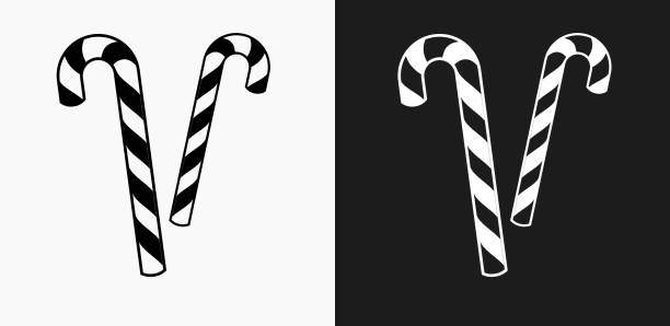 Candy Canes Icon on Black and White Vector Backgrounds Candy Canes Icon on Black and White Vector Backgrounds. This vector illustration includes two variations of the icon one in black on a light background on the left and another version in white on a dark background positioned on the right. The vector icon is simple yet elegant and can be used in a variety of ways including website or mobile application icon. This royalty free image is 100% vector based and all design elements can be scaled to any size. candy cane stock illustrations