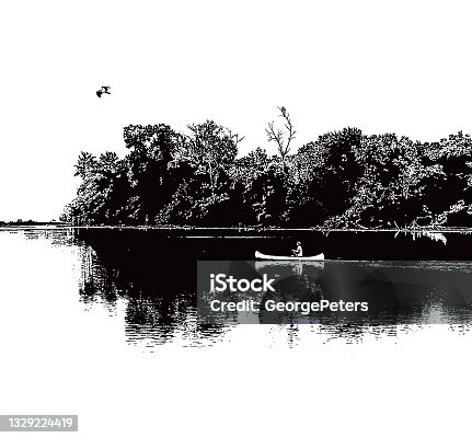 istock Canoeing on a tranquil lake with Osprey 1329224419