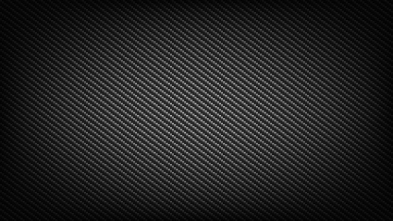 Carbon fiber wide screen background. Technological and science backdrop.