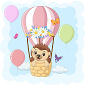 Vector illustration of Cartoon baby hedgehog riding a hot air balloon
