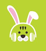Cartoon Tiger wearing a  Rabbit's headset, , enjoy the music,vector