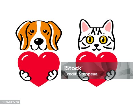 istock Cat and dog holding a heart 1326139274