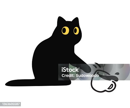 istock Cat knocking cup off table 1363605587