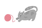 istock Cat plays with yarn ball. Hand drawn flat vector illustration of cute kitten. 1316113508